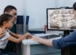 https://www.pexels.com/photo/a-man-and-a-girl-having-a-dental-consultation-with-a-dentist-6502163/ A father and daughter speak with a family dentist about her dental x-rays