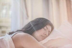 https://www.pexels.com/photo/photo-of-woman-sleeping-3807626/ Woman sleeping with oral appliance